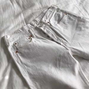 White Levi’s 501 jeans.